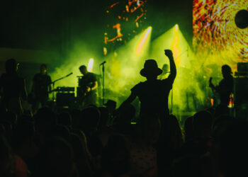 Man in a concert audience having fun on a music festival