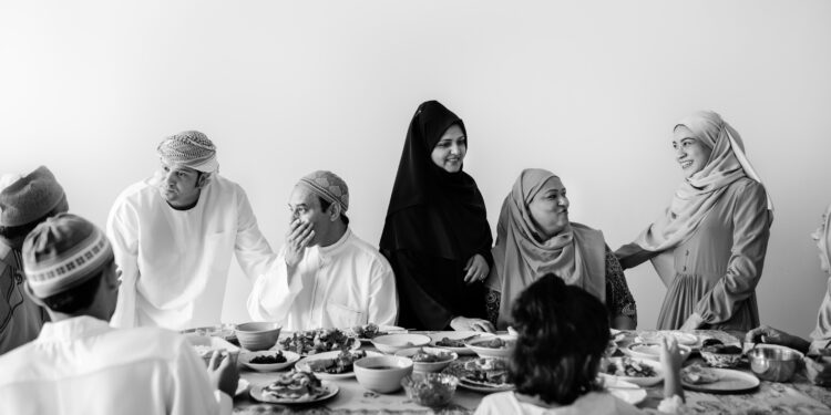 Community members distributing free food on Hazrat Ali’s birthday in India as part of charity and communal service.