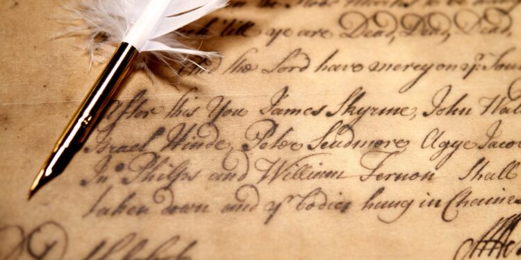 Museum exhibit in the Caribbean displaying historical photographs, ship records, and artefacts related to Indo-Caribbean indenture history and migration journeys.